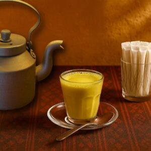 Milk and cardamom with saffron pot